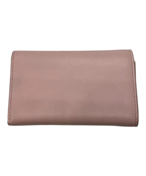 TOD'S（トッズ）TOD'S (トッズ) メタルバー3つ折り財布 ピンクの古着・服飾アイテム