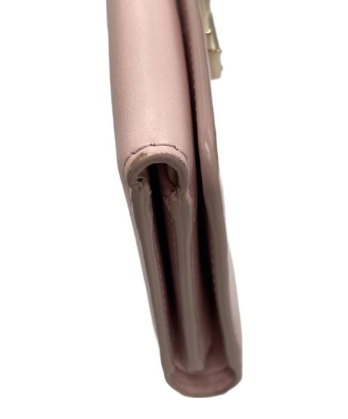 TOD'S（トッズ）TOD'S (トッズ) メタルバー3つ折り財布 ピンクの古着・服飾アイテム