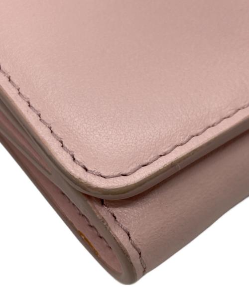 TOD'S（トッズ）TOD'S (トッズ) メタルバー3つ折り財布 ピンクの古着・服飾アイテム