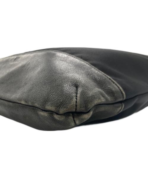 ISSEY MIYAKE（イッセイミヤケ）ISSEY MIYAKE (イッセイミヤケ) レザーナイロン巾着バッグ ブラックの古着・服飾アイテム