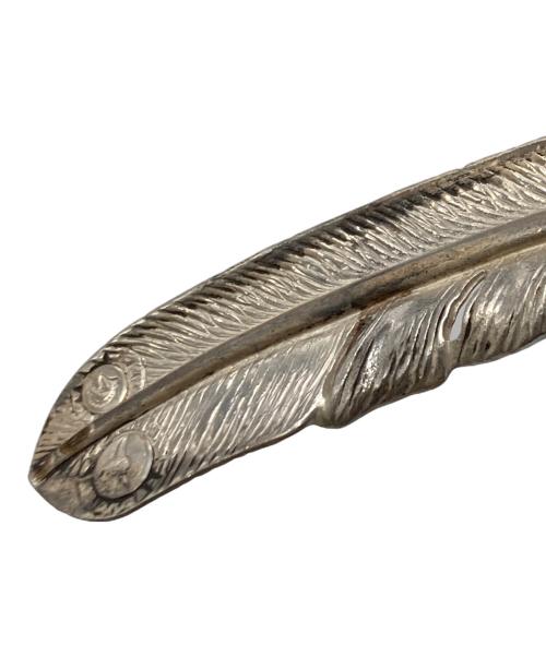 Tady & King（タディアンドキング）Tady & King (タディアンドキング) 左向きフェザーネックレストップの古着・服飾アイテム