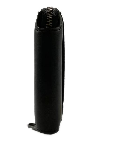 ck Calvin Klein（シーケーカルバンクライン）ck Calvin Klein (シーケーカルバンクライン) 2つ折りラウンドジップ財布 / レザージップハーフウォレット ブラックの古着・服飾アイテム