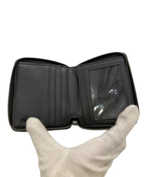 ck Calvin Klein（シーケーカルバンクライン）ck Calvin Klein (シーケーカルバンクライン) 2つ折りラウンドジップ財布 / レザージップハーフウォレット ブラックの古着・服飾アイテム