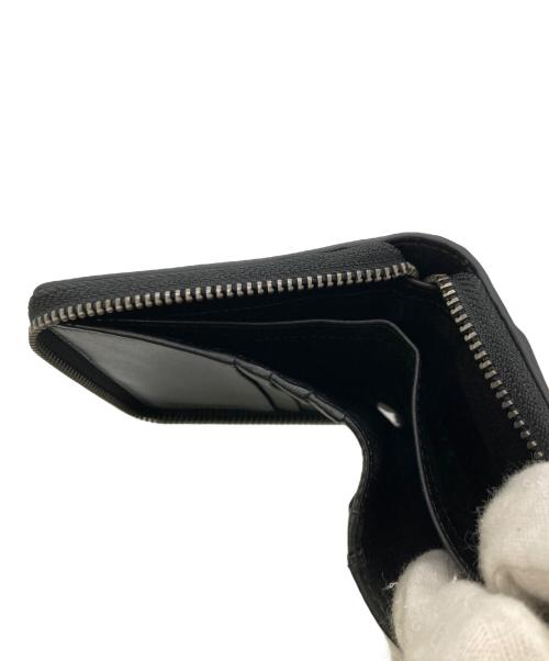 ck Calvin Klein（シーケーカルバンクライン）ck Calvin Klein (シーケーカルバンクライン) 2つ折りラウンドジップ財布 / レザージップハーフウォレット ブラックの古着・服飾アイテム