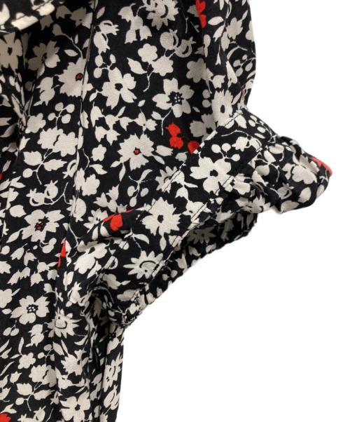 POLO RALPH LAUREN（ポロ・ラルフローレン）POLO RALPH LAUREN (ポロ・ラルフローレン) 総柄フラワーボタンノースリーブワンピース ブラック×ホワイト サイズ:4の古着・服飾アイテム