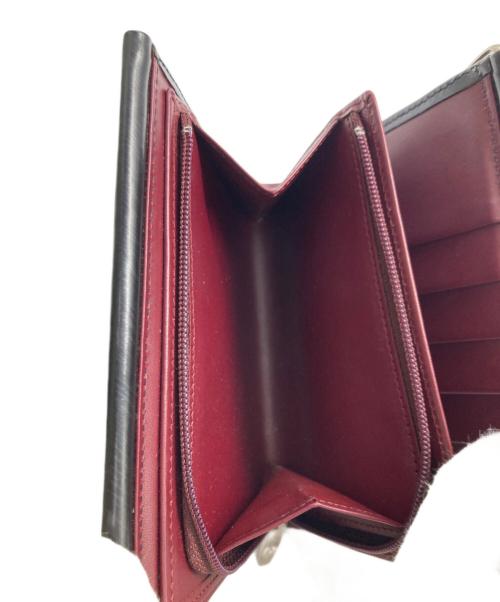 Cartier（カルティエ）Cartier (カルティエ) ハンドル付2つ折り財布 ブラックの古着・服飾アイテム