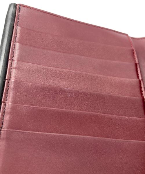 Cartier（カルティエ）Cartier (カルティエ) ハンドル付2つ折り財布 ブラックの古着・服飾アイテム