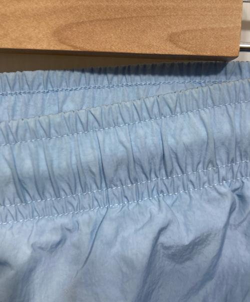 NIKE（ナイキ）NIKE (ナイキ) ソロスウッシュウーブントラックハパンツ スカイブルー サイズ:Lの古着・服飾アイテム