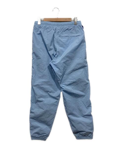 NIKE（ナイキ）NIKE (ナイキ) ソロスウッシュウーブントラックハパンツ スカイブルー サイズ:Lの古着・服飾アイテム