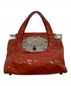 MIU MIUミュウミュウ）の古着「ターンロック エナメルハンドバッグ」｜朱色
