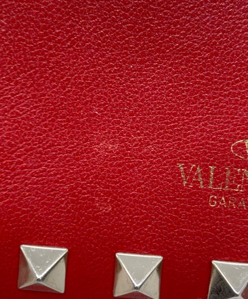 VALENTINO GARAVANI（ヴァレンティノ・ガラヴァーニ）VALENTINO GARAVANI (ヴァレンティノ・ガラヴァーニ) スタッズ2つ折り財布 レッドの古着・服飾アイテム