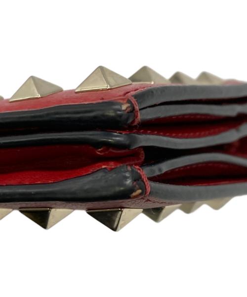 VALENTINO GARAVANI（ヴァレンティノ・ガラヴァーニ）VALENTINO GARAVANI (ヴァレンティノ・ガラヴァーニ) スタッズ2つ折り財布 レッドの古着・服飾アイテム