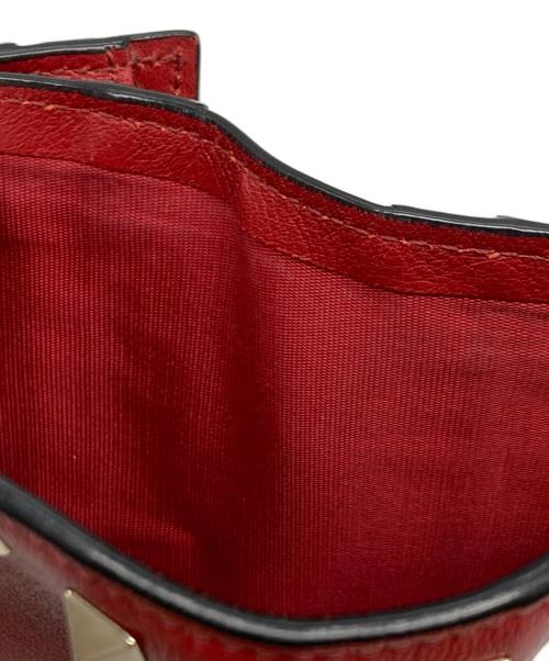VALENTINO GARAVANI（ヴァレンティノ・ガラヴァーニ）VALENTINO GARAVANI (ヴァレンティノ・ガラヴァーニ) スタッズ2つ折り財布 レッドの古着・服飾アイテム