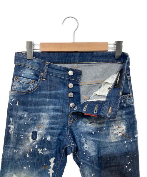 DSQUARED2（ディースクエアード）DSQUARED2 (ディースクエアード) ペイントクラッシュデニムパンツ インディゴ サイズ:W42の古着・服飾アイテム