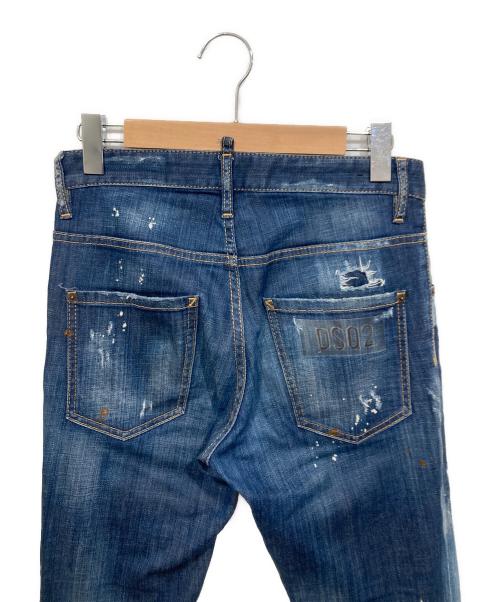DSQUARED2（ディースクエアード）DSQUARED2 (ディースクエアード) ペイントクラッシュデニムパンツ インディゴ サイズ:W42の古着・服飾アイテム