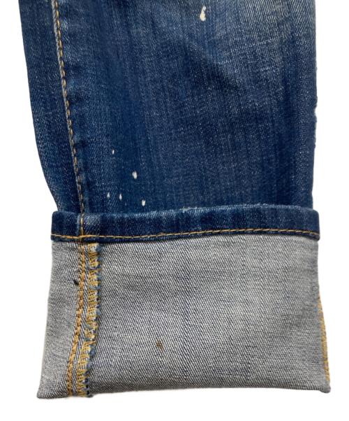 DSQUARED2（ディースクエアード）DSQUARED2 (ディースクエアード) ペイントクラッシュデニムパンツ インディゴ サイズ:W42の古着・服飾アイテム