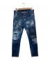 DSQUARED2（ディースクエアード）の古着「ペイントクラッシュデニムパンツ」｜インディゴ