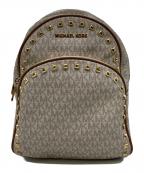 MICHAEL KORSマイケル・コース）の古着「スタッズ付リュック/MK柄　バックパック」｜ベージュ
