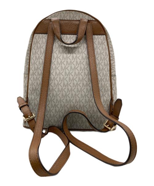 MICHAEL KORS（マイケル・コース）MICHAEL KORS (マイケル・コース) スタッズ付リュック/MK柄　バックパック ベージュの古着・服飾アイテム