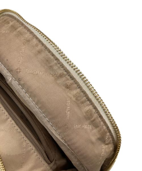 MICHAEL KORS（マイケル・コース）MICHAEL KORS (マイケル・コース) スタッズ付リュック/MK柄　バックパック ベージュの古着・服飾アイテム