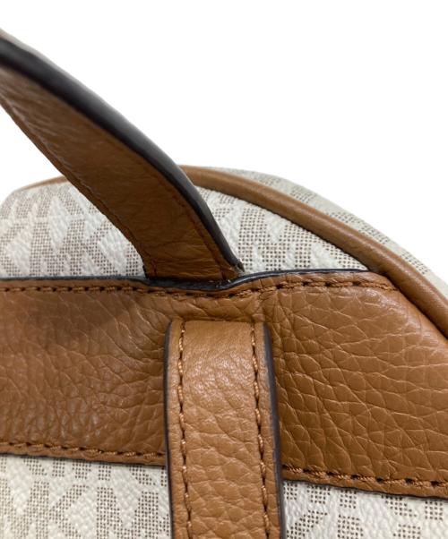 MICHAEL KORS（マイケル・コース）MICHAEL KORS (マイケル・コース) スタッズ付リュック/MK柄　バックパック ベージュの古着・服飾アイテム