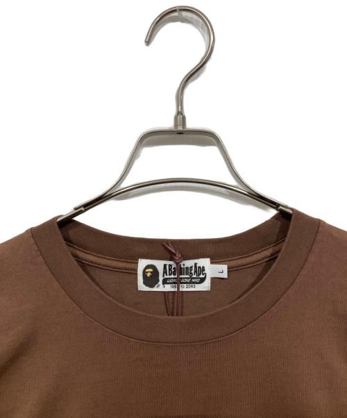 A BATHING APE（ア ベイシング エイプ）A BATHING APE (ア ベイシング エイプ) GARMENT DYE COLLEGE RELAXED FIT LS TEE ブラウン サイズ:L 未使用品の古着・服飾アイテム
