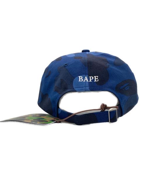 A BATHING APE（ア ベイシング エイプ）A BATHING APE (ア ベイシング エイプ) COLOR CAMO APE HEAD ONE POINT PANEL CAP ネイビー サイズ:F 未使用品の古着・服飾アイテム