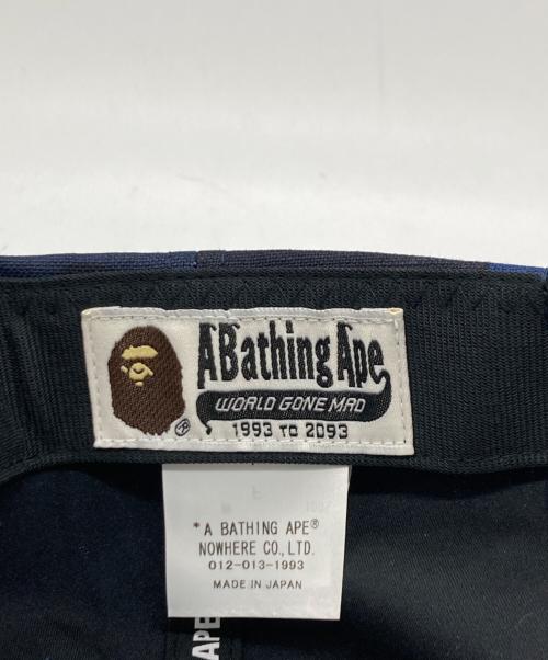 A BATHING APE（ア ベイシング エイプ）A BATHING APE (ア ベイシング エイプ) COLOR CAMO APE HEAD ONE POINT PANEL CAP ネイビー サイズ:F 未使用品の古着・服飾アイテム
