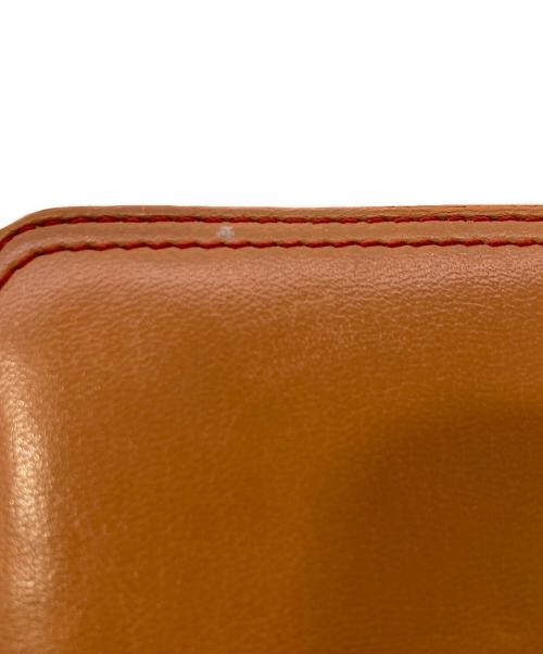 J&M DAVIDSON（ジェイ＆エム デヴィッドソン）J&M DAVIDSON (ジェイ＆エム デヴィッドソン) コインケース オレンジの古着・服飾アイテム