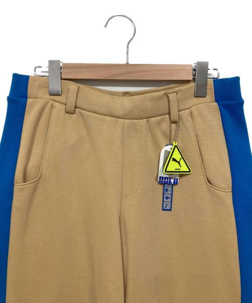 PUMA（プーマ）PUMA (プーマ) ADER error (アーダーエラー) T7 オーバーレイ ウィメンズ パンツ ベージュ サイズ:Ｍの古着・服飾アイテム