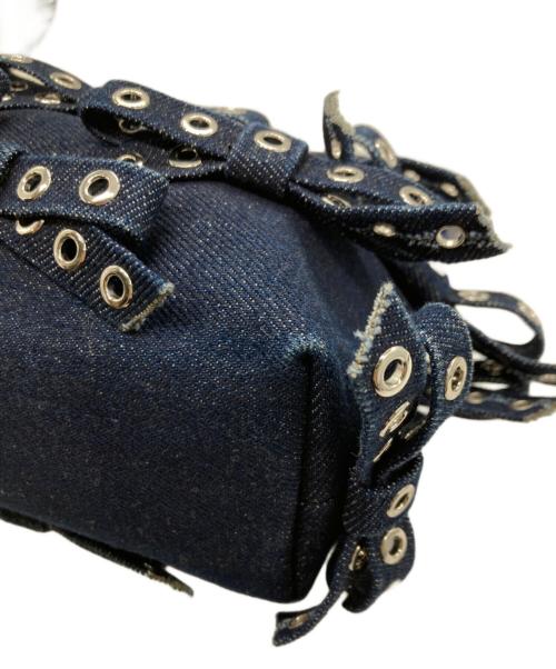 GANNI（ガニー）Ganni (ガニー) デニムリボンミニハンドバッグ / BUTTERFLY SMALL POUCH BOW EYELET MIX DENIM インディゴの古着・服飾アイテム