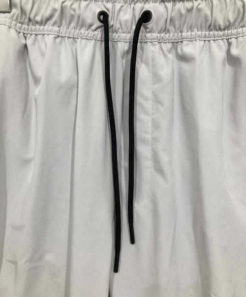 NIKE（ナイキ）NIKE (ナイキ) ドライフィット アンリミテッド テーパードレッグパンツ グレー サイズ:Ｍの古着・服飾アイテム