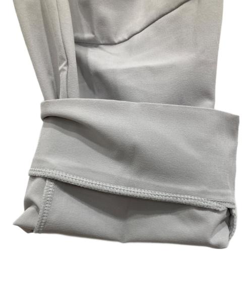 NIKE（ナイキ）NIKE (ナイキ) ドライフィット アンリミテッド テーパードレッグパンツ グレー サイズ:Ｍの古着・服飾アイテム
