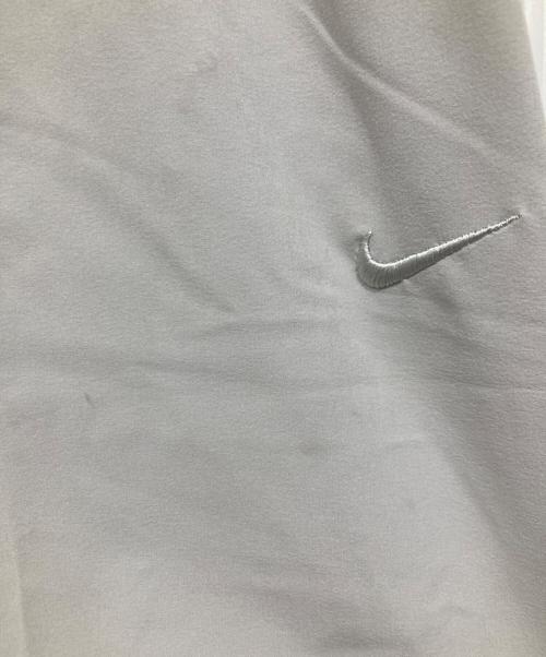 NIKE（ナイキ）NIKE (ナイキ) ドライフィット アンリミテッド テーパードレッグパンツ グレー サイズ:Ｍの古着・服飾アイテム