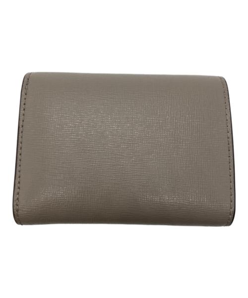 TORY BURCH（トリーバーチ）TORY BURCH (トリーバーチ) 2つ折り財布 ベージュの古着・服飾アイテム