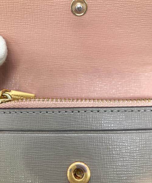 TORY BURCH（トリーバーチ）TORY BURCH (トリーバーチ) 2つ折り財布 ベージュの古着・服飾アイテム