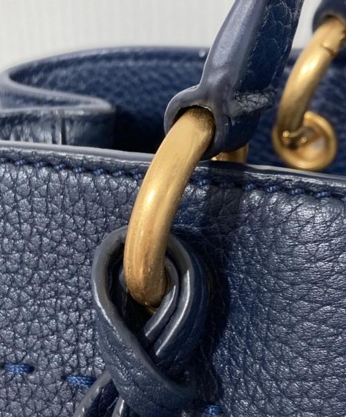 TORY BURCH（トリーバーチ）TORY BURCH (トリーバーチ) マックグロータッセルトートバッグ ネイビーの古着・服飾アイテム