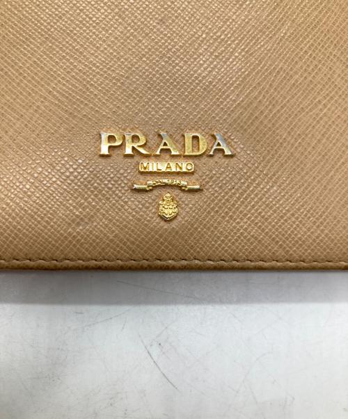 PRADA（プラダ）PRADA (プラダ) 2つ折り財布 ベージュの古着・服飾アイテム