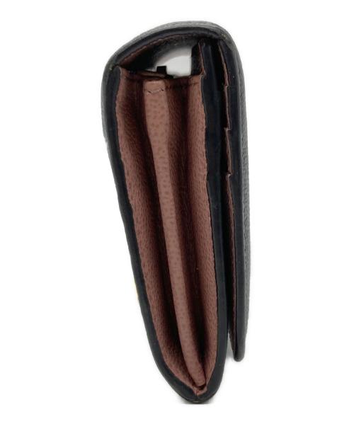 TOD'S（トッズ）TOD'S (トッズ) 長財布 ブラック×ピンクの古着・服飾アイテム