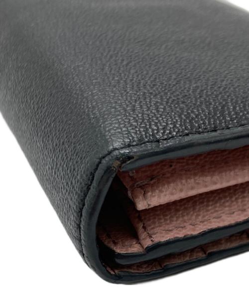 TOD'S（トッズ）TOD'S (トッズ) 長財布 ブラック×ピンクの古着・服飾アイテム