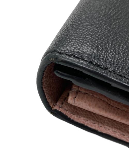 TOD'S（トッズ）TOD'S (トッズ) 長財布 ブラック×ピンクの古着・服飾アイテム