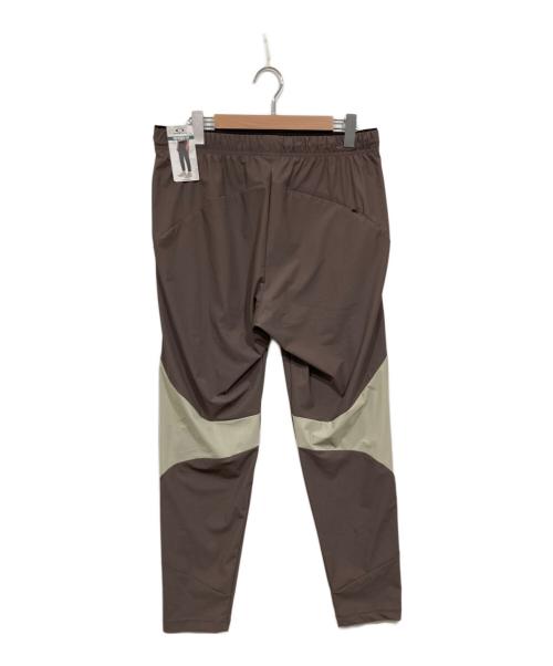 OAKLEY（オークリー）OAKLEY (オークリー) トレーニングパンツ ブラウン サイズ:XL 未使用品の古着・服飾アイテム
