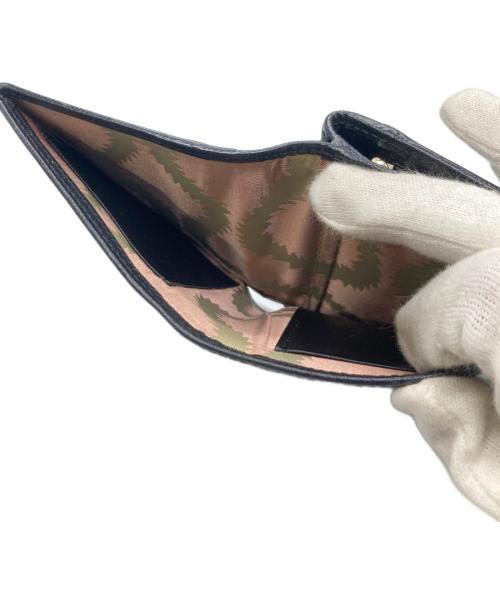 Vivienne Westwood（ヴィヴィアンウエストウッド）Vivienne Westwood (ヴィヴィアンウエストウッド) がま口2つ折り財布 ブラックの古着・服飾アイテム