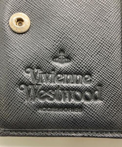 Vivienne Westwood（ヴィヴィアンウエストウッド）Vivienne Westwood (ヴィヴィアンウエストウッド) がま口2つ折り財布 ブラックの古着・服飾アイテム