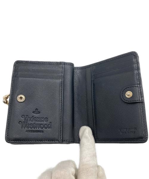 Vivienne Westwood（ヴィヴィアンウエストウッド）Vivienne Westwood (ヴィヴィアンウエストウッド) がま口2つ折り財布 ブラックの古着・服飾アイテム