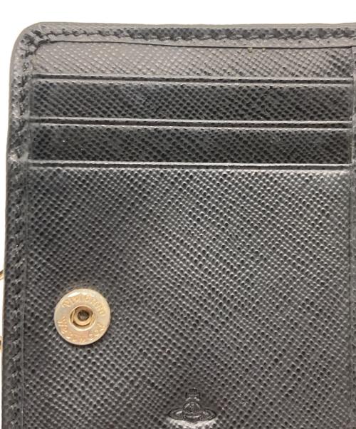 Vivienne Westwood（ヴィヴィアンウエストウッド）Vivienne Westwood (ヴィヴィアンウエストウッド) がま口2つ折り財布 ブラックの古着・服飾アイテム