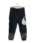 NIKE（ナイキ）の古着「SWOOSH WOVEN UL PANTS」｜ブラック
