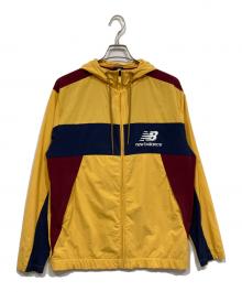 NEW BALANCE（ニューバランス）の古着「ナイロンジャケット」｜イエロー×ネイビー