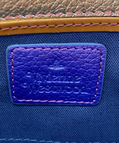 Vivienne Westwood（ヴィヴィアンウエストウッド）Vivienne Westwood (ヴィヴィアンウエストウッド) SIVA パテントレザー ラウンドファスナー長財布 マルチカラーの古着・服飾アイテム
