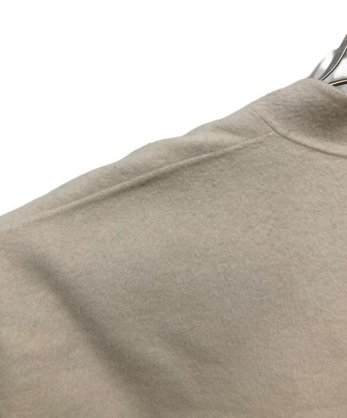 uncrave（アンクレイヴ）uncrave (アンクレイヴ) リバーロングコート アイボリーの古着・服飾アイテム